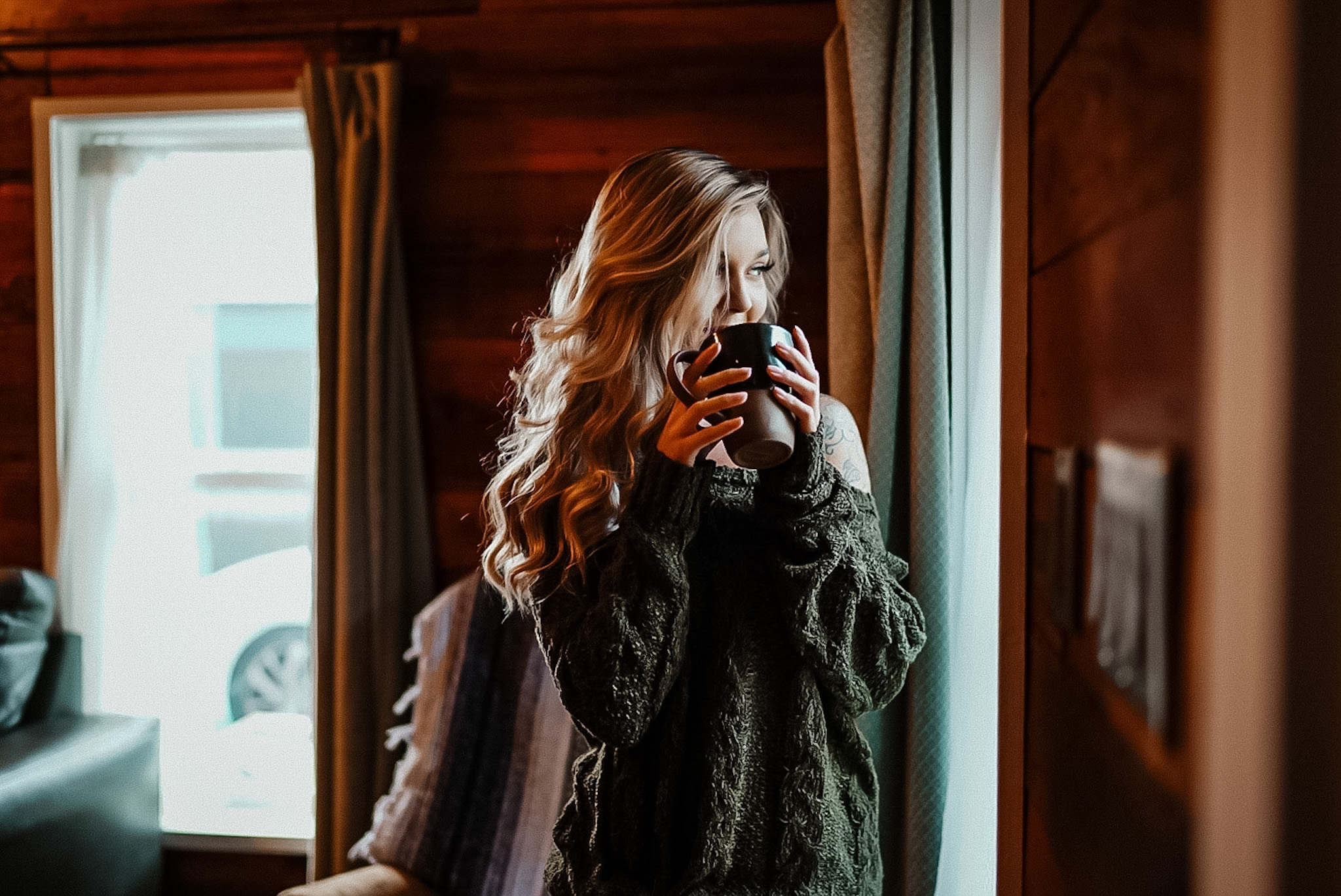 Portrait in a warm-lit coffee cabin